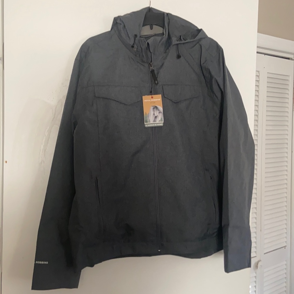 Grey men’s Royal Robbins waterproof jacket size large. New with tags No blemish